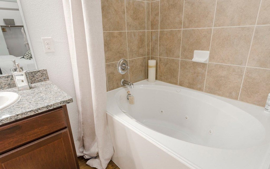 Oversized Soaking Tub In Bath at Berkshire Jones Forest, Conroe, Texas