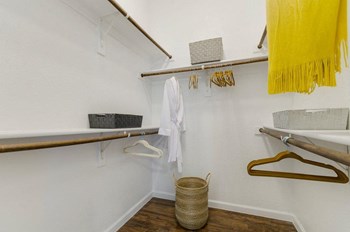 Walk In Closets With Built In Shelving Walk-In Closets With Built-In Shelving at Berkshire Jones Forest, Conroe, TX - Photo Gallery 4