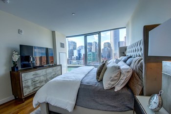 The Benjamin Seaport Residences-Primary Bedroom with Waterfront View and En-Suite Bath - Photo Gallery 30