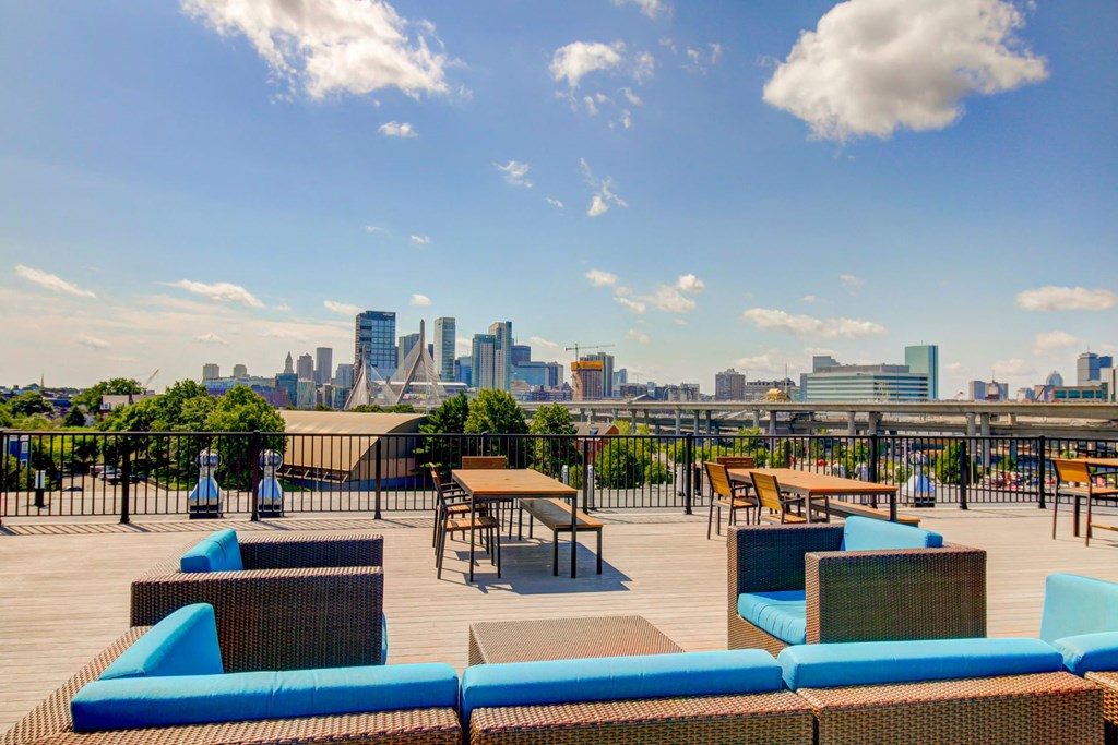 Charlestown MA Apartments with Rooftop Outdoor Living Room with  Fireside Lounge featuring fantastic views of Boston