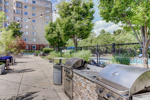Outdoor Kitchen, BBQ, Living Green Space with Firepit and Outdoor Movies and Pool--HighPoint Apartments Quincy MA