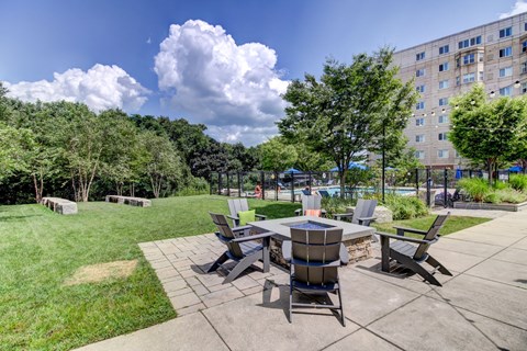 HighPoint Apartments Outdoor Living Room with Green Space, FirePit, Pool, Gaming, Outdoor Kitchen with BBQ and Alfresco Dining