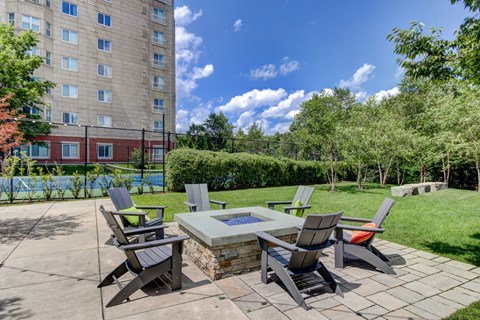 Outdoor Living Green Space with Firepit and Outdoor Movies--HighPoint Apartments Quincy MA