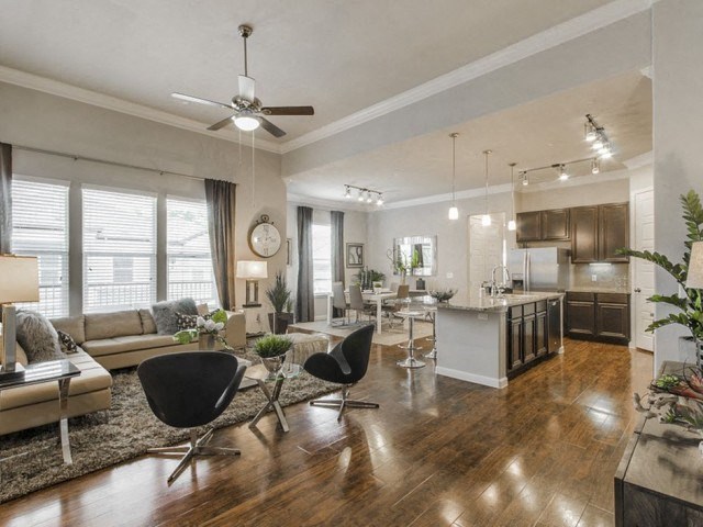Luxury Vinyl Plank Flooring In Kitchen And Living Room at Berkshire Woodland, Conroe, 77384