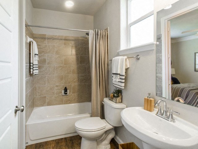 Bathroom With Bathtub at Berkshire Woodland, Conroe, Texas