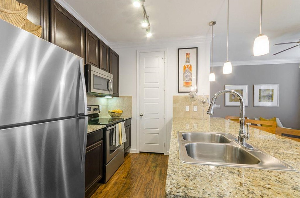 Stainless Steel Sink With Faucet In Kitchen at Berkshire Lakeway, Lakeway, TX