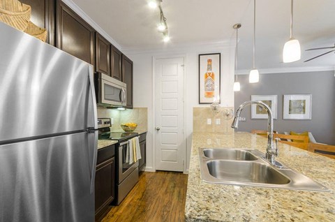 Stainless Steel Sink With Faucet In Kitchen at Berkshire Lakeway, Lakeway, TX