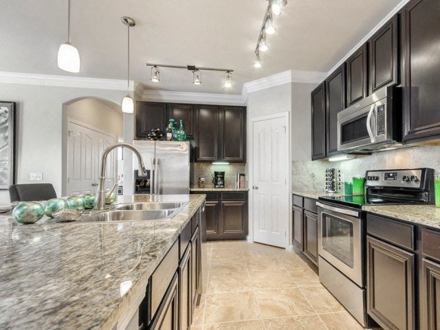 Well Equipped Kitchen at Villages of Briggs Ranch, Texas, 78245