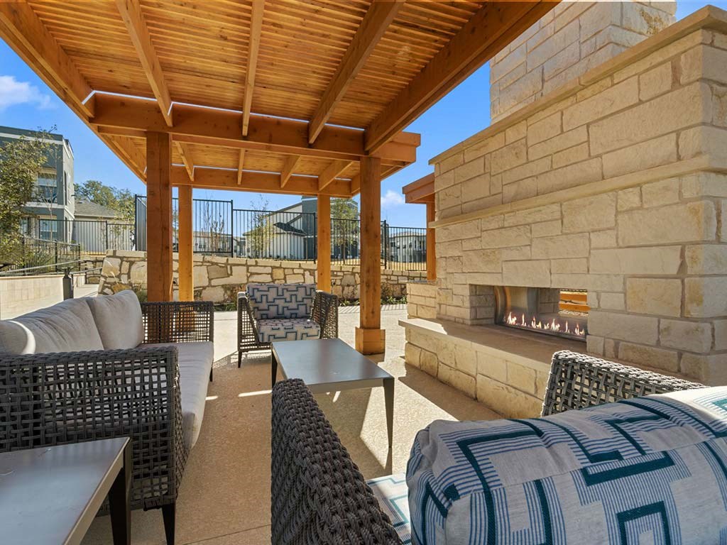Outdoor sitting area with firepit at Reveal 54, Georgetown, TX