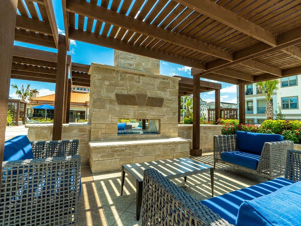 Pool side sitting area at Parkat Bayside, Texas, 75088