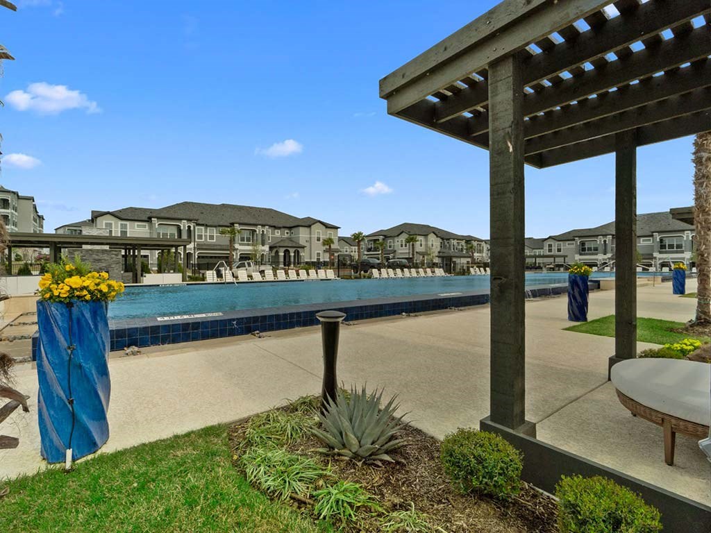 Pool side area at Reveal on the Lake, Rowlett, TX, 75088