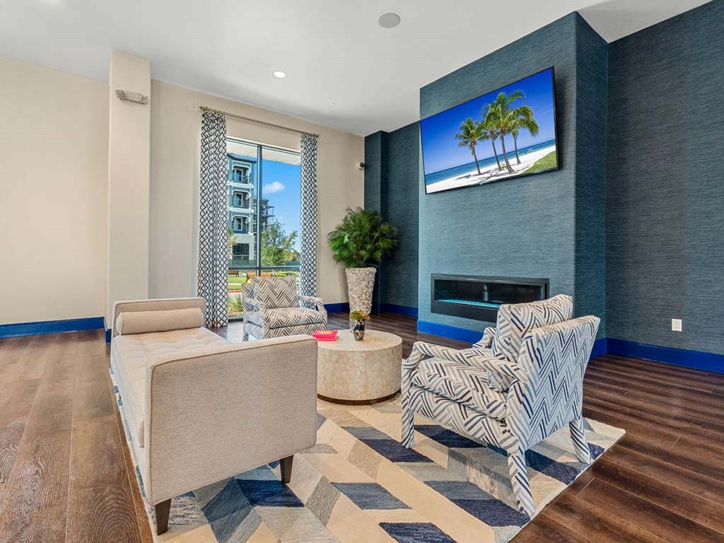 Living room with tv at Reveal on the Lake, Texas