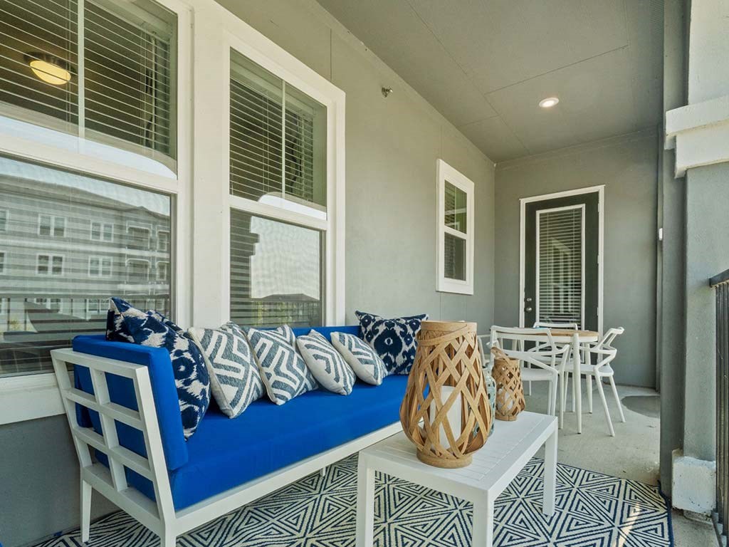 Balcony sitting area at Reveal on the Lake, Rowlett, TX