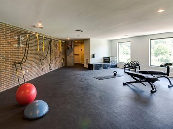 Amenities-fitness center with free weights fitness center with free weights at Berkshire Dilworth, Charlotte, North Carolina - Photo Gallery 3