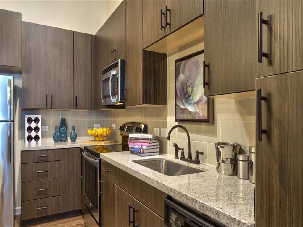 Kitchen With Stainless Appliances at Berkshire Main Street, North Carolina, 27705