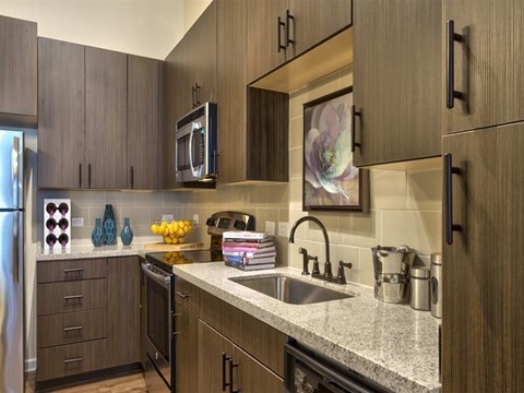 Interiors- kitchen Kitchen With Stainless Appliances at Berkshire Main Street, North Carolina, 27705