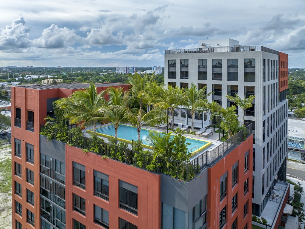 an aerial view of a rooftop swimming pool