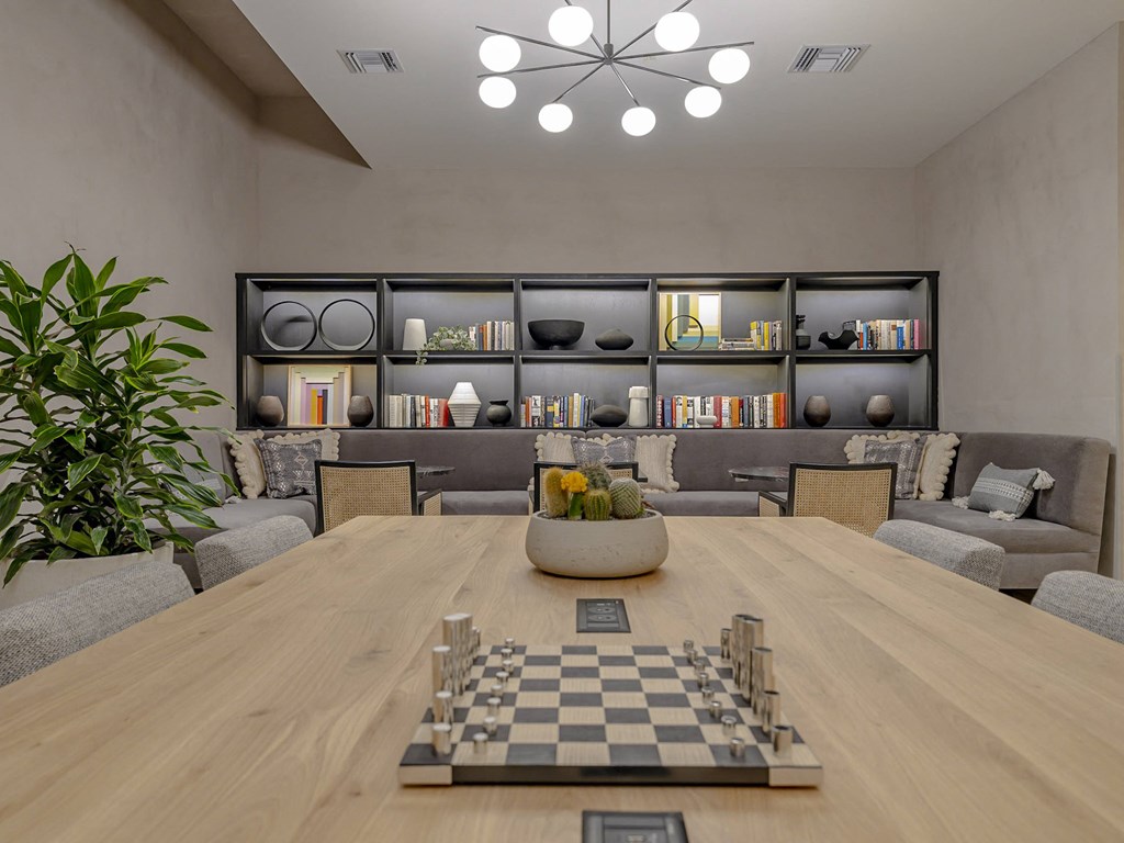 social spaces with a chess board on a wooden table