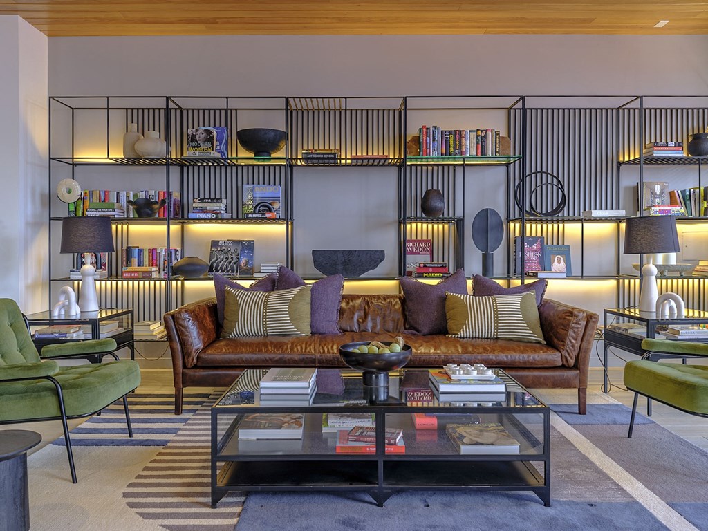 a social lounge with couches and chairs and a table