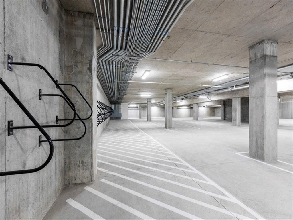 Parking structure bike racks at Cook Street Apartments, Portland