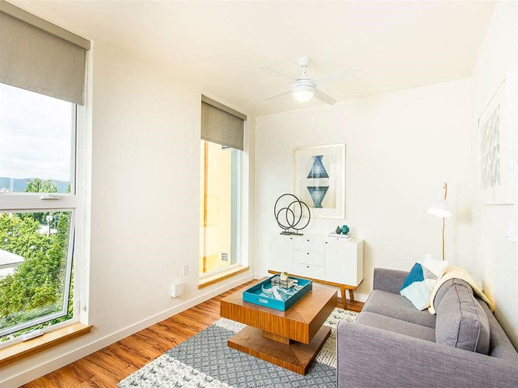 Living Room With Expansive Window at Lower Burnside Lofts, Portland