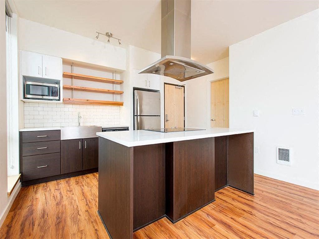 Kitchen and Island at Lower Burnside Lofts, Oregon, 97214