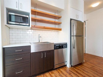 Refrigerator And Kitchen Appliances at Lower Burnside Lofts, Portland, OR, 97214 - Photo Gallery 16