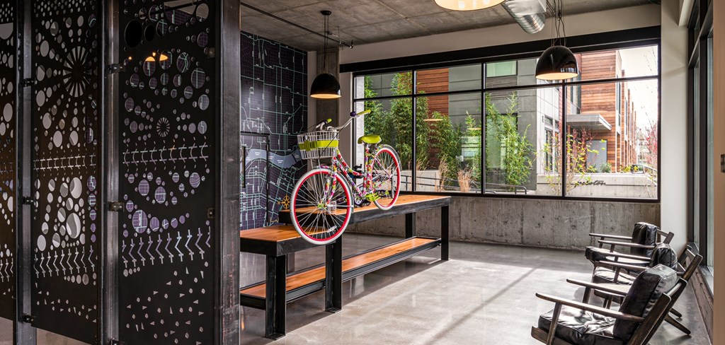 A room with a bench and bicycle