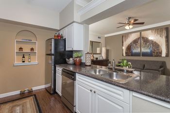 Fully Furnished Kitchen With Stainless Steel Appliances at The Plaza Museum District, Texas