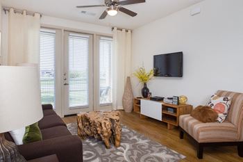 Living Room With Television at The Pradera, Richardson, TX