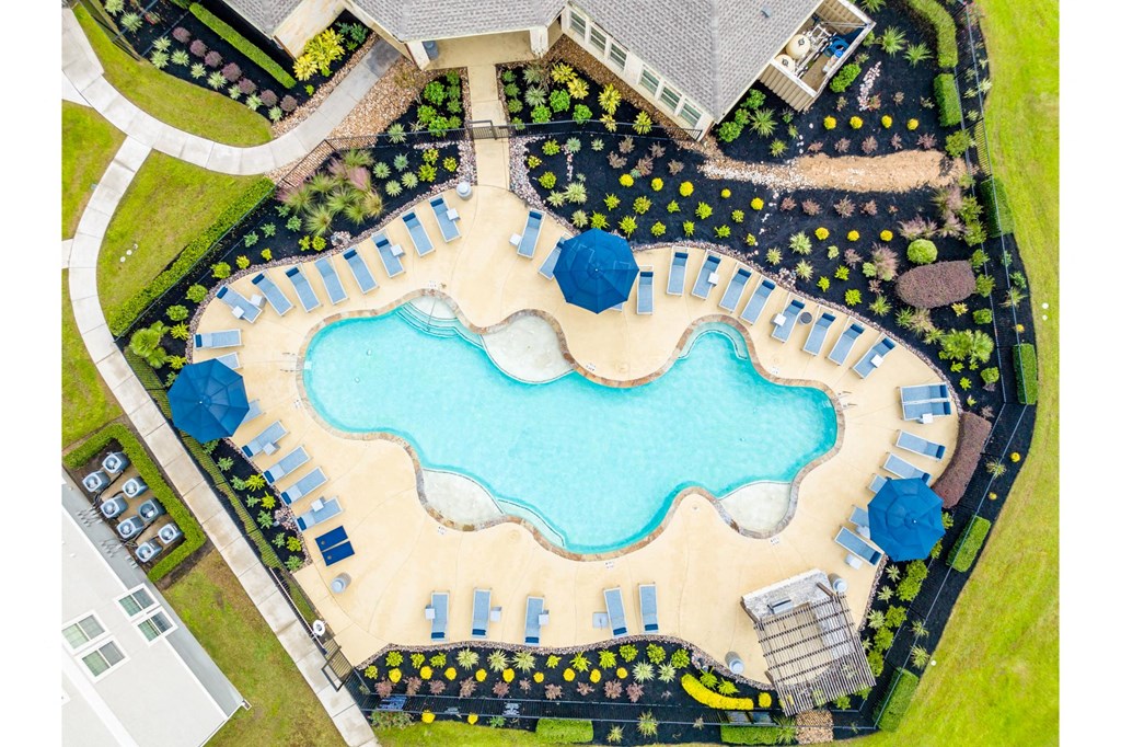 an aerial view of the swimming pool at Retreat at Magnolia apartments