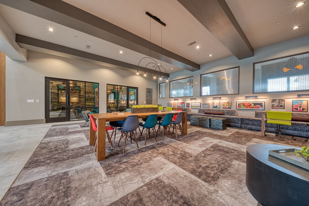 Multifunctional Resident Lounge with Media at The Retreat at the Rim