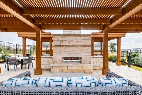 Outdoor Fireplace and Social Lounge Area at Reveal 54 Apartments