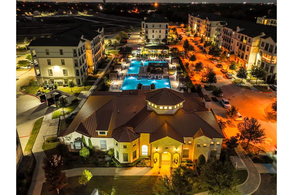 Evening Aerial View of Reveal at Bayside Apartments 8400 Sunset Blvd Rowlett, TX 75088