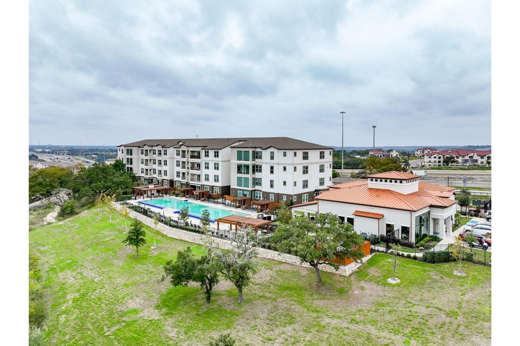 Aerial View of Pool and Leasing Office at Reveal at Onion Creek  12000 S IH 35 Frontage Rd Austin, TX Rowlett, TX 78747
