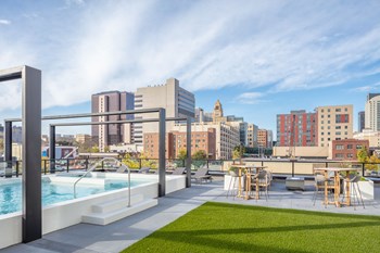 Amenities New Apartments Downtown Rochester MN near Mayo Clinic with Spa Pool and Sundeck with Spectacular views of Downtown Rochester-The Maven on Broadway - Photo Gallery 4