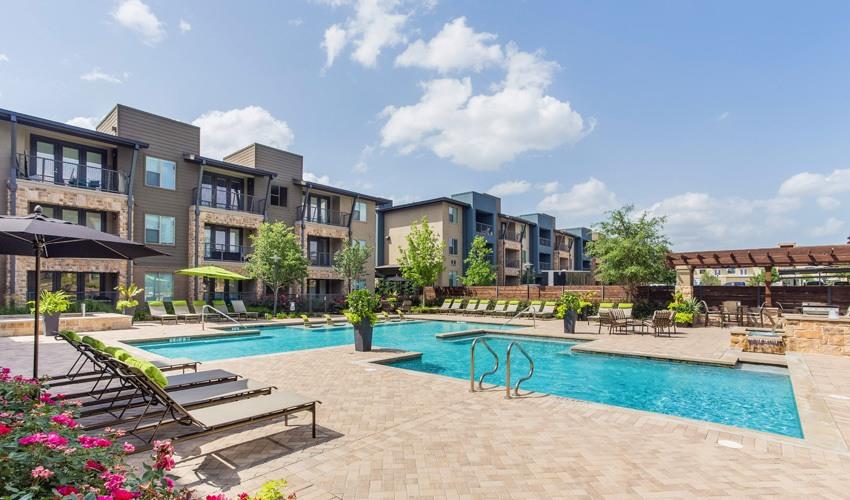 Swimming Pool With Relaxing Sundecks at Berkshire Medical District, Texas