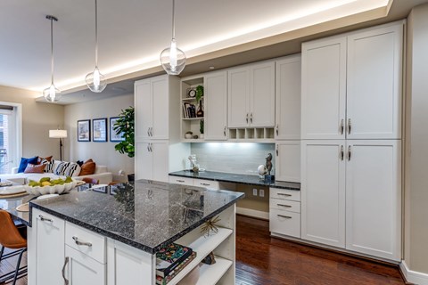 kitchen with white cabinets at The Ivy luxury apartments