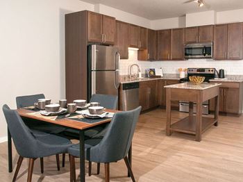 Open Concept Studio, 1, 2 and 3 Bedroom Apartments with Chefs Kitchen with Prep Island and Dining and Home Office Space-Berkshire Central- 9436 Ulysses Street NE Blaine, MN. 55434