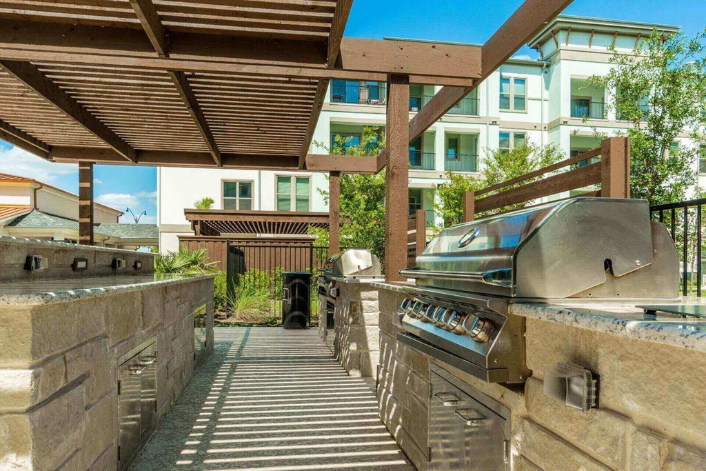 Grill outside at Reveal at Bayside, Rowlett, TX, 75088