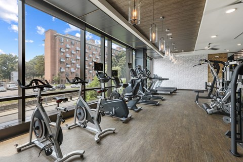 Trellis House apartments fitness center with spin bikes