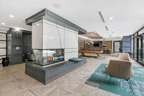 Trellis House apartments social lounge with fireplace