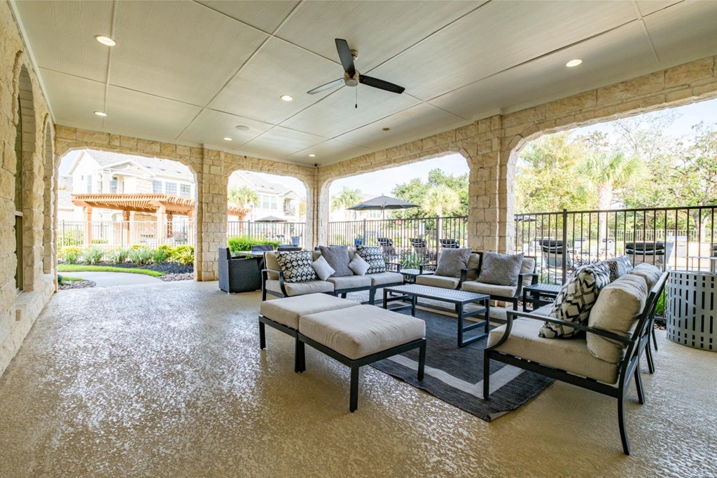 Covered Outdoor Poolside Patio at Villages of Magnolia Apartments