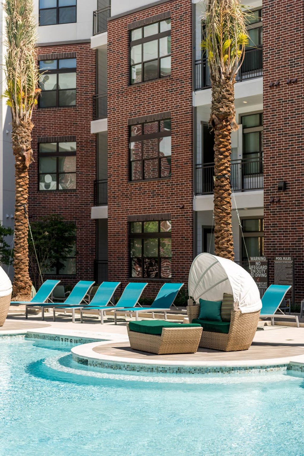 swimming pool with cabanas at Tinsley on the Park apartments