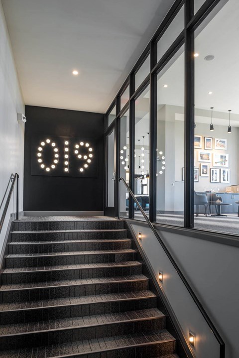 a staircase in the lobby at Tinsley on the Park apartments