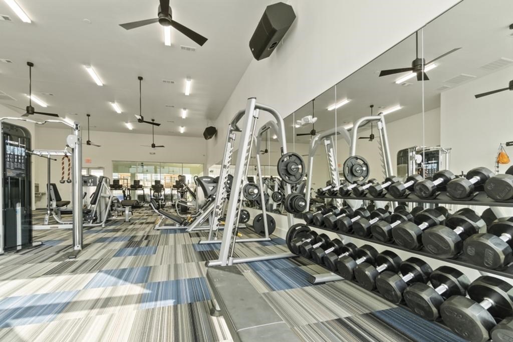 Free Weights In Gym at Reveal 54, Georgetown, Texas