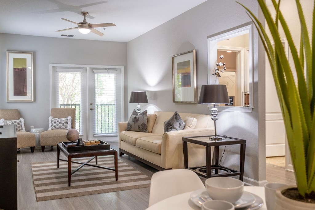 an interior view of a couch at Verano apartments