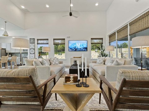 Living room with tv at Reveal 54, Texas