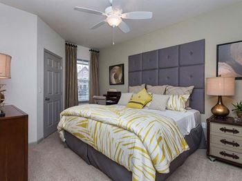 Bedroom With Ceiling Fan at Berkshire Aspen Grove, Littleton