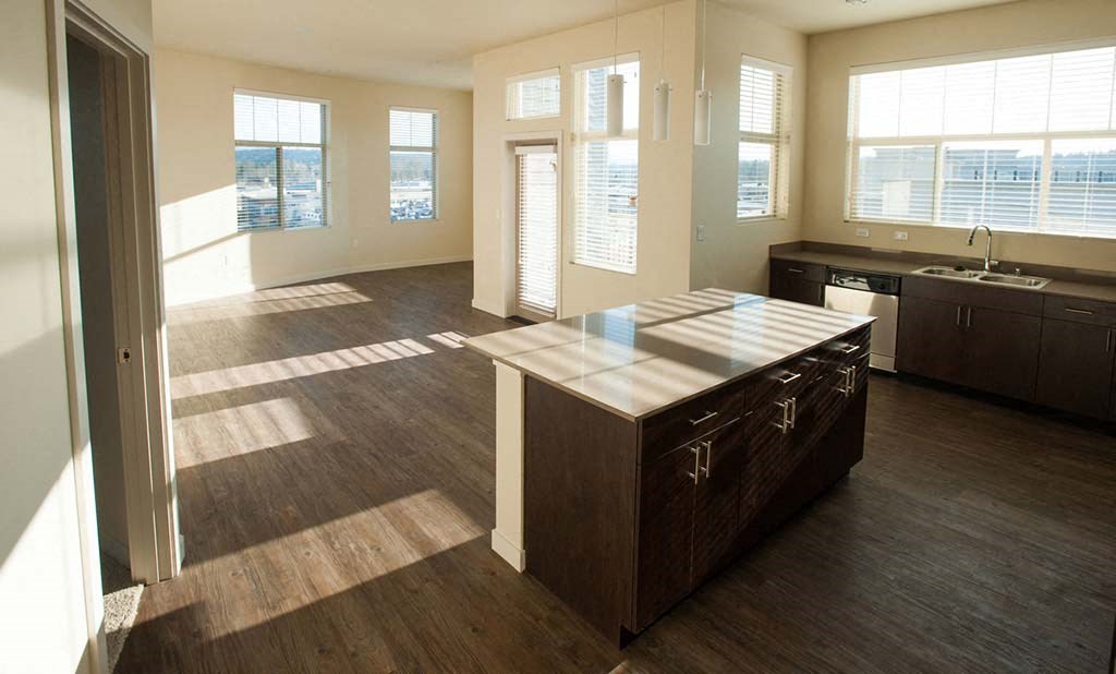 Kitchen and living area at Elan Redmond Apartments, Redmond